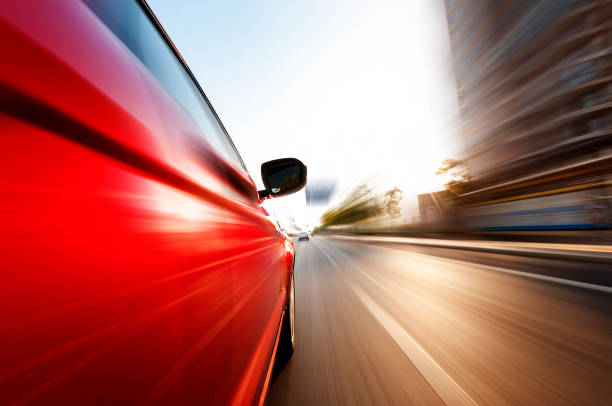 istock car on the road with motion blur background. 641119064