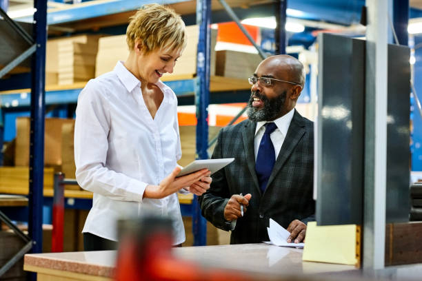 istock Business colleagues in distribution warehouse 641119270