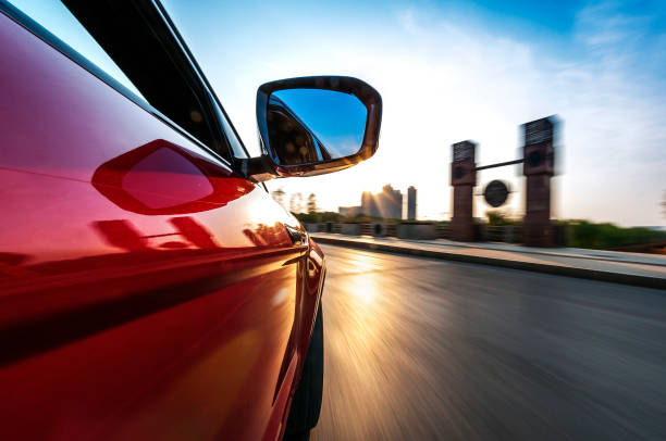 istock car on the road with motion blur background. 641119360