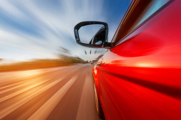 istock car on the road with motion blur background. 641119376