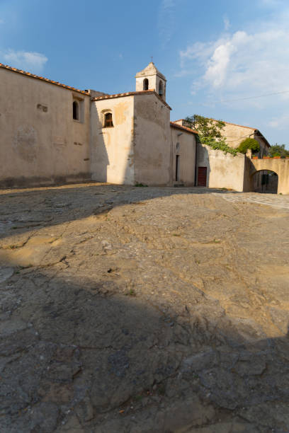 istock Populonia village and church 641119446