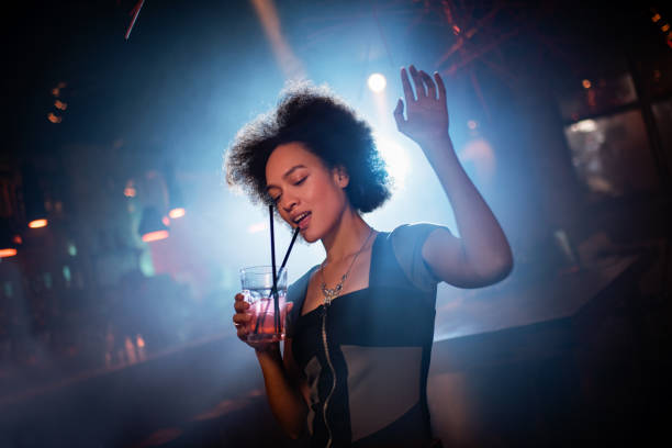 istock Woman dancing in the club 641124410