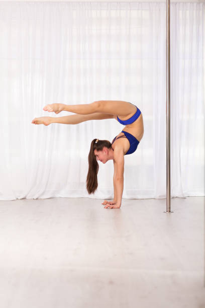 160+ Pole Dancer Doing The Splits Stock Photos, Pictures & Royalty-Free  Images - iStock