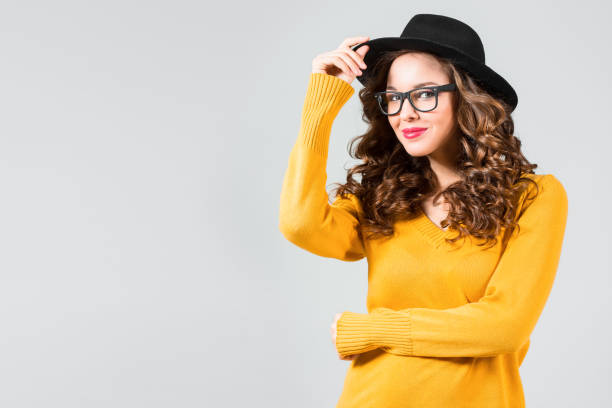 istock The girl in glasses and hat 641132800