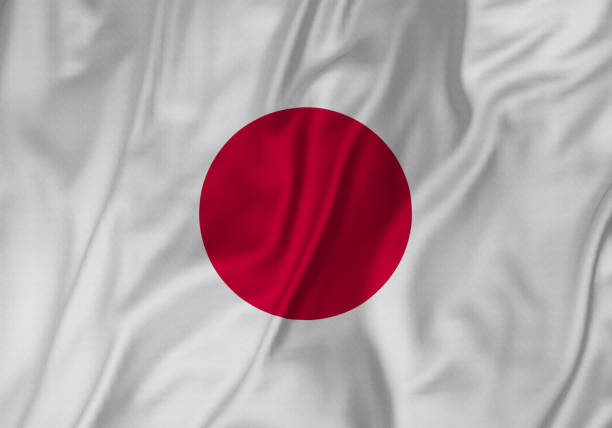 closeup of ruffled japan flag, japan flag blowing in wind - japan flag japanese flag white imagens e fotografias de stock