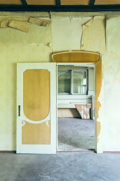 open door in an old abandoned house