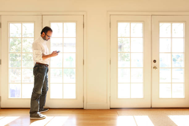 istock Hispanic Businessman Working From Home On His Mobile Phone 641146692
