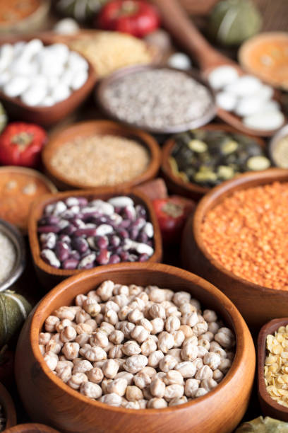 istock Colorful spices in bowls on wooden table 641149804