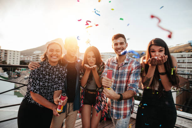 istock Best friends on a rooftop party 641150456
