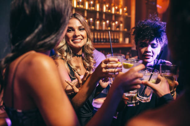 istock Group of friends having drinks at night club 641153048