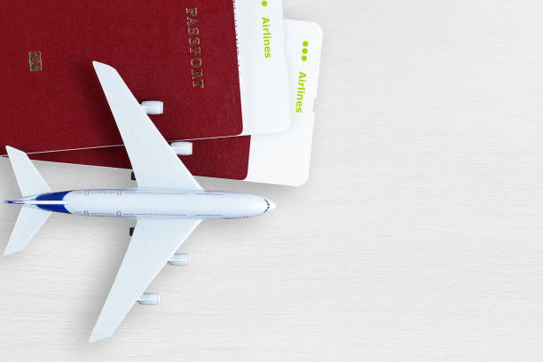 istock Boarding passes, passports and toy plane 641156400