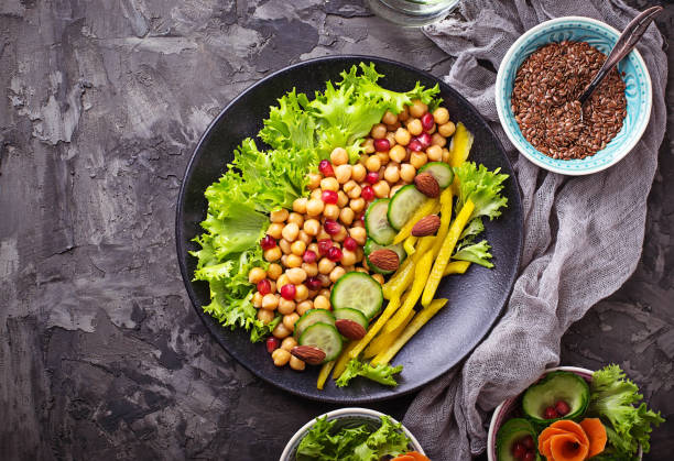 istock Salad with cucumber, pepper, pomegranate chick-pea 641157238