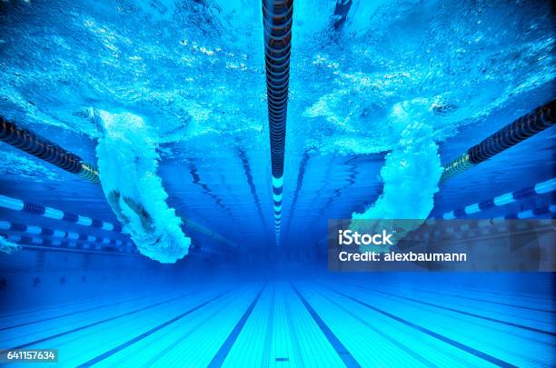 Jump In A Blue Pool Stock Photo - Download Image Now - Diving Into Water, Starting Line, Blue