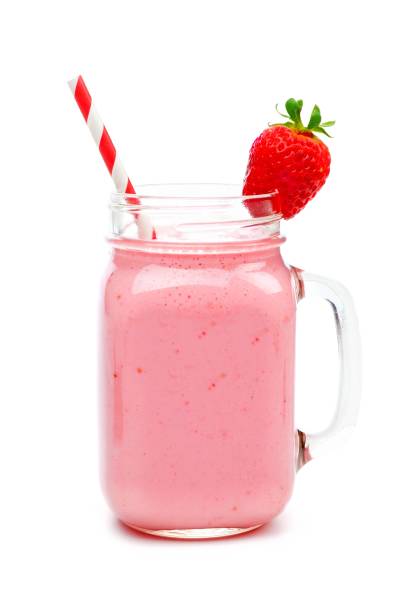 Strawberry smoothie in a mason jar isolated on white