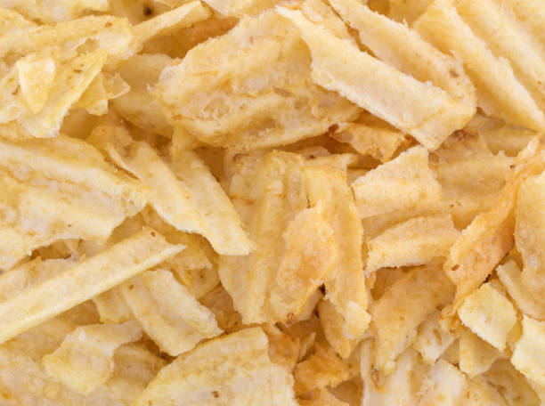 istock Close view of broken potato chips 641161232