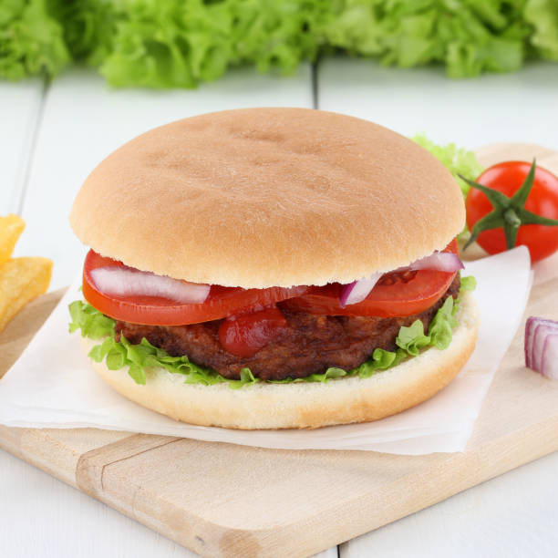 istock Hamburger fresh beef onion tomatoes lettuce 641161246