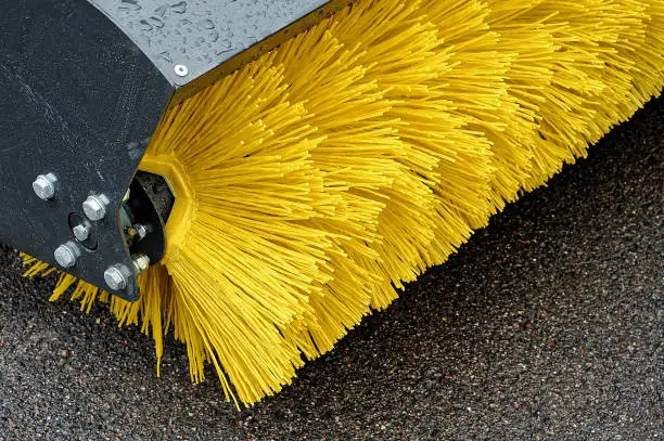 Photo of Yellow Brush of the Road Cleaner.