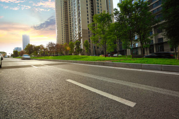 istock Empty road surface floor with City streetscape buildings 641166474