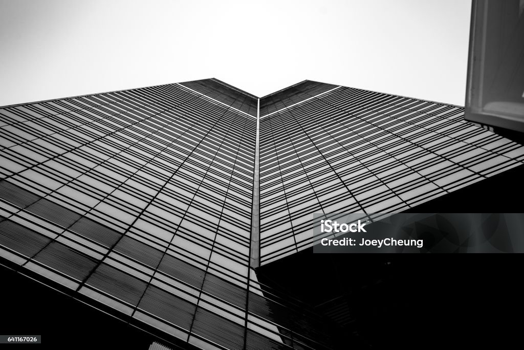 Windows of  commercial building in Hong Kong with B&W color Architecture Stock Photo