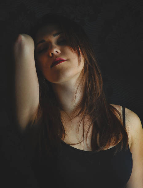 istock fashion model on a dark background 641172510