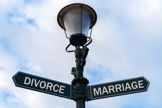 istock Divorce versus Marriage directional signs on guidepost 641172996