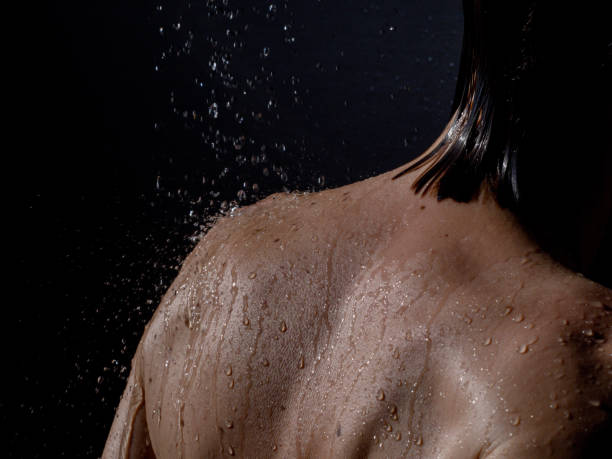 istock Woman under the shower 641175434