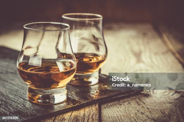 Whiskey With Ice In Glasses Stock Photo - Download Image Now - Whiskey, Bourbon Whiskey, Drinking Glass