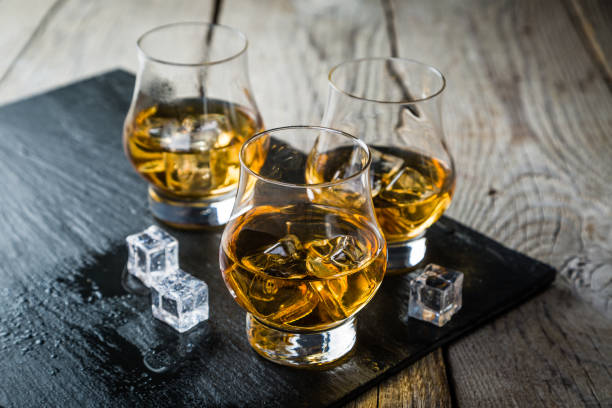 istock Whiskey with ice in glasses 641176312
