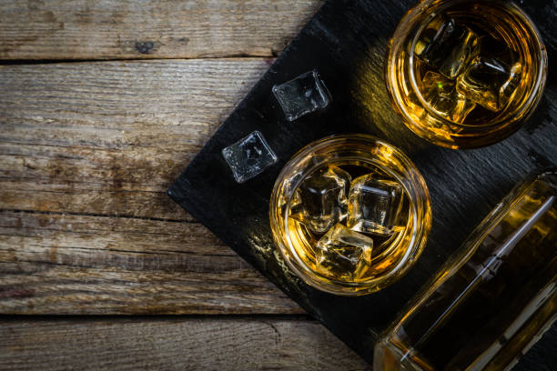 istock Whiskey with ice in glasses 641176362