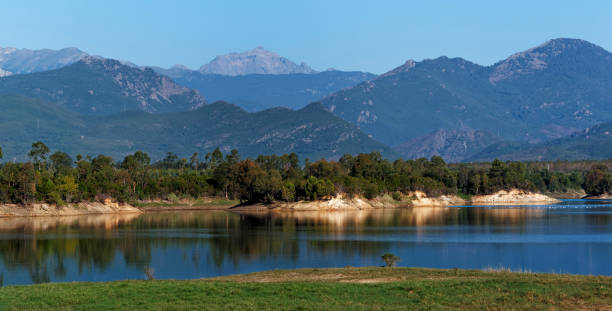 istock Lake in eastern plain of Corsica 641178582