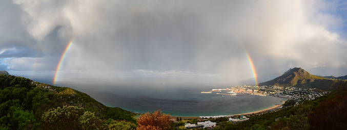 A magnificent double rainbow over Simon's Town, on False Bay, South Africa