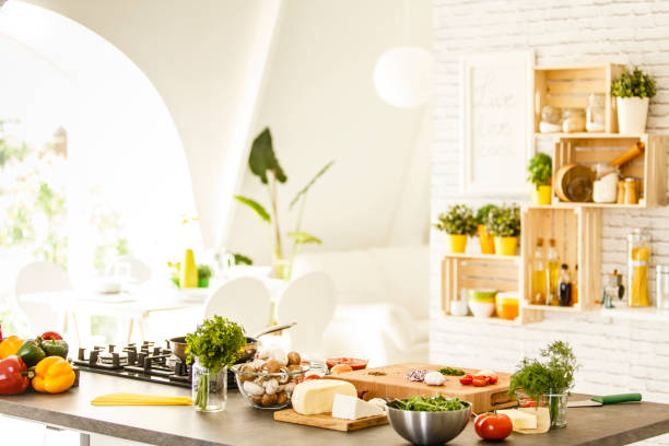 Vegetables, mushrooms and cheese on countertop