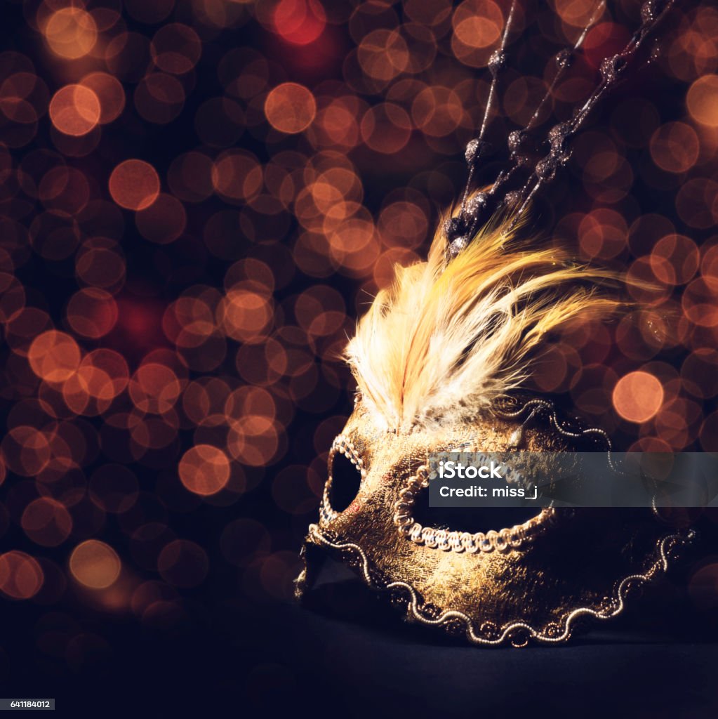 Golden venetian mask Golden venetian mask over black background Antique Stock Photo