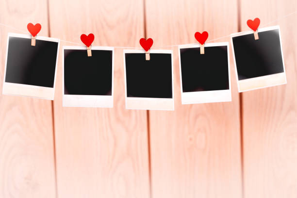 istock Blank instant photos hanging on the clothesline 641184028