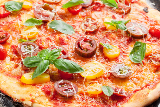 istock Homemade pizza with tomatoes, mozzarella and basil 641184064