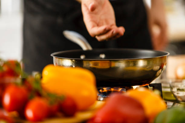 Celf Cook 250+ Chef Cooking Over Fire Stock Photos, Pictures & Royalty-Free ...