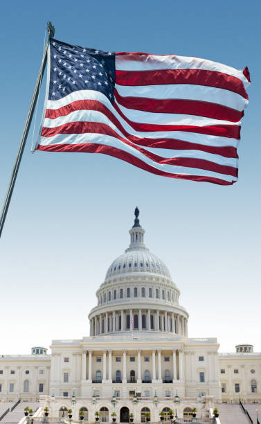 istock capitol building in washington dc with us flag 641188578