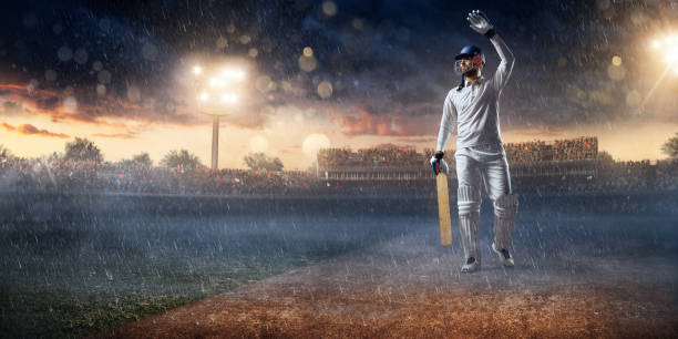 istock Cricket: Batsman on the stadium in action 641189032