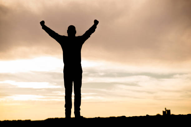 istock Fresh New Morning - Man and  bright morning sunrise 641189996