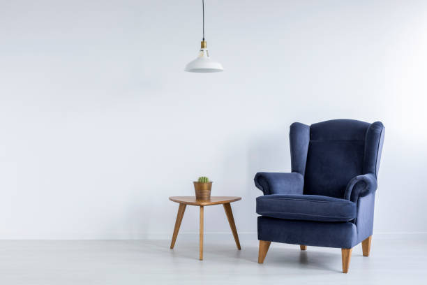 istock Bright interior with blue armchair 641191522