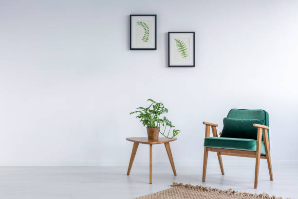 istock White interior with kale green chair 641191584