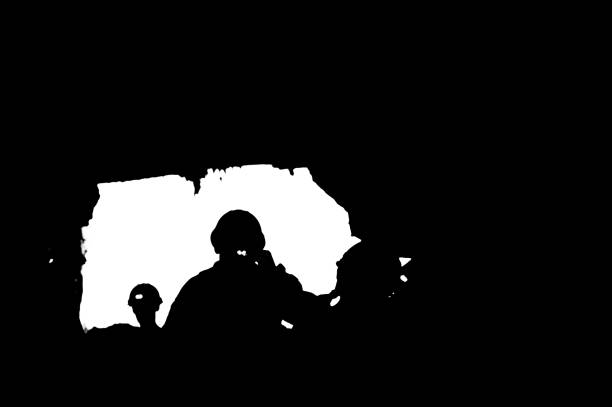 Miners with headlamp silhouette