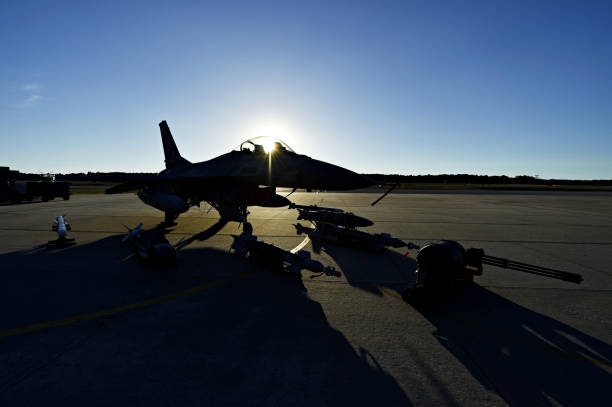 istock Fighter aircraft with ammunition and missiles 641194068