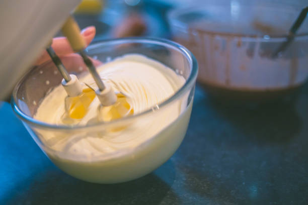 istock happy woman cooking on kitchen 641194844