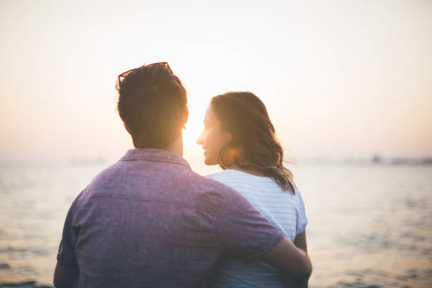 istock Couple in love in the sunset 641196042