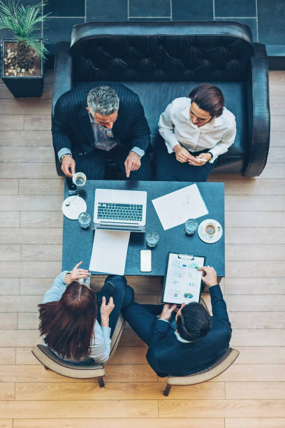 istock Upper view of a group on a business meeting 641197362