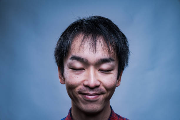 istock Mid adult man looking very relaxed and serene 641202100