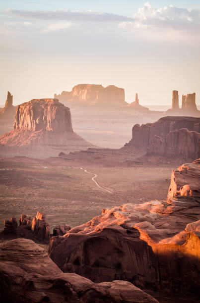 The Hunt's Mesa, Monument Valley Utah - Ariziona border, panorama of the Monument Valley from a remote point of view, known as The Hunt's Mesa butte rocky outcrop photos stock pictures, royalty-free photos & images