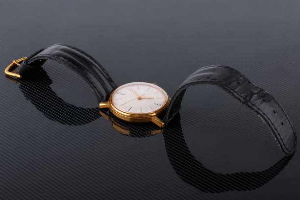istock old soviet wristwatch on black glossy background 641206198