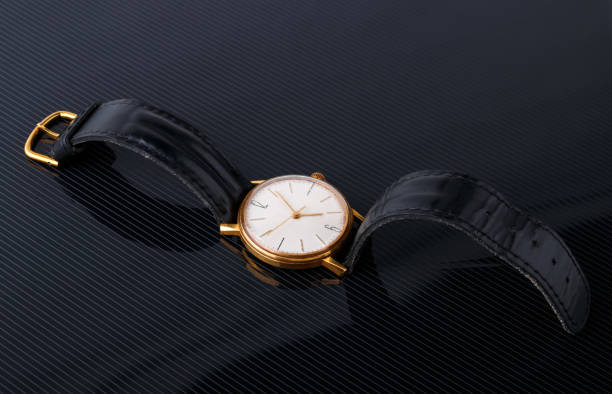 istock old soviet wristwatch on black glossy background 641206228